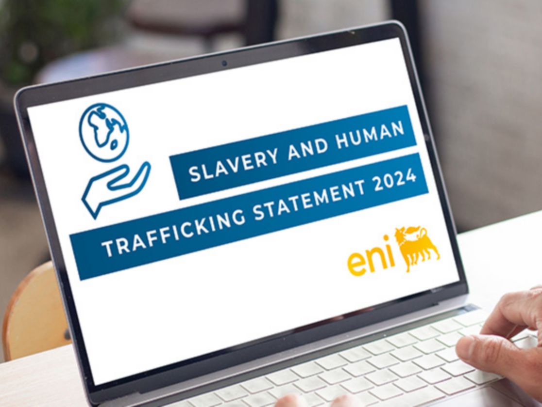 An open laptop resting on a table, with the words Slavery and Human Trafficking Statement 2024 displayed on the screen.