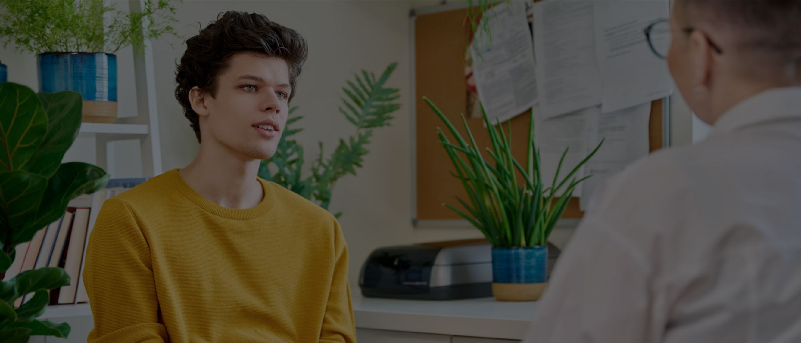 boy talking to a counsellor