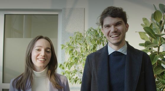 Boy and girl form Graduate Program