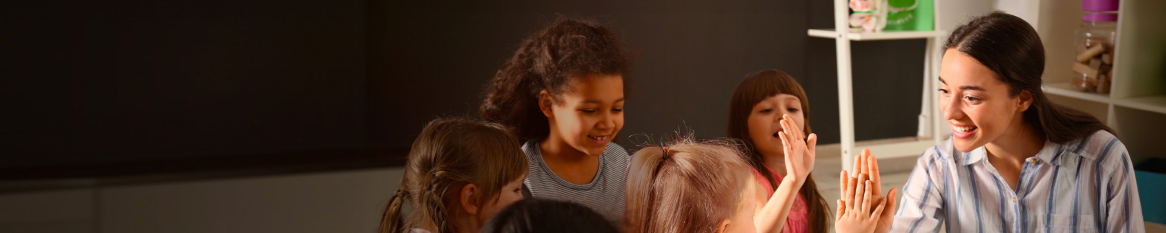 Children high-fiving