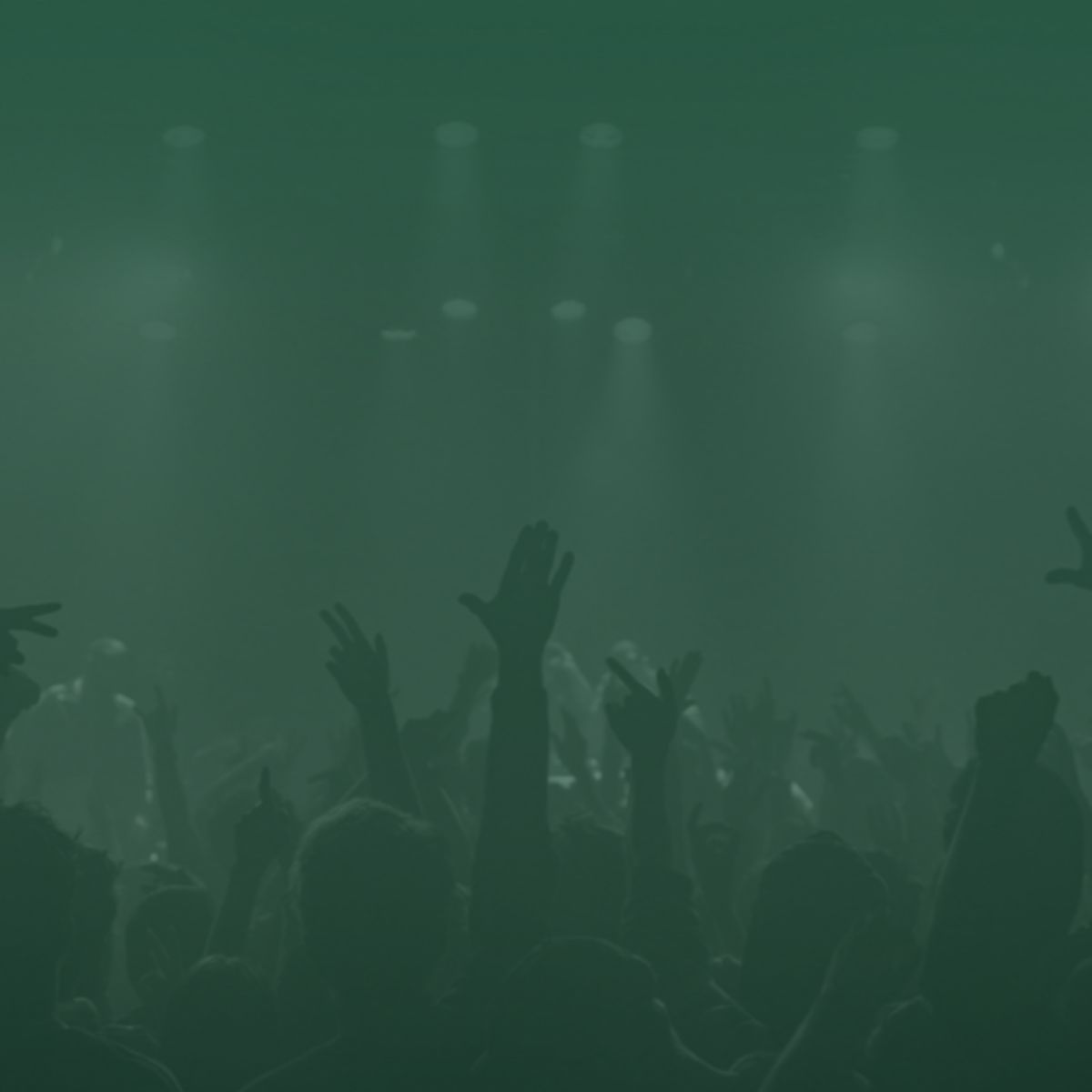 Many people seems to dance with hands in the air, the image has a green gradient.