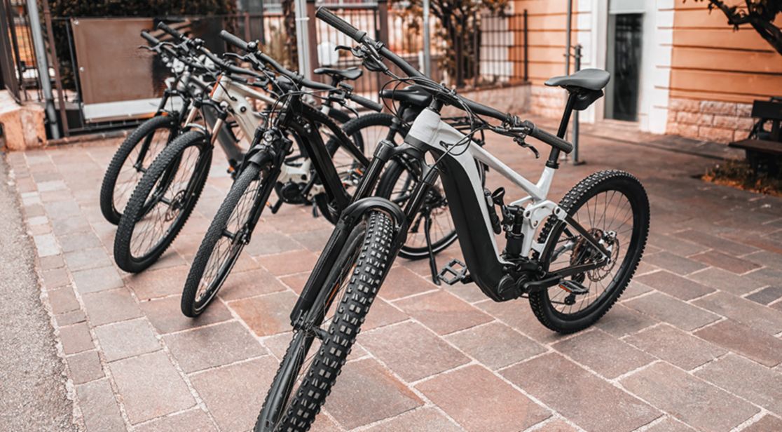Electric Bikes Parked Outside Urban Shop 