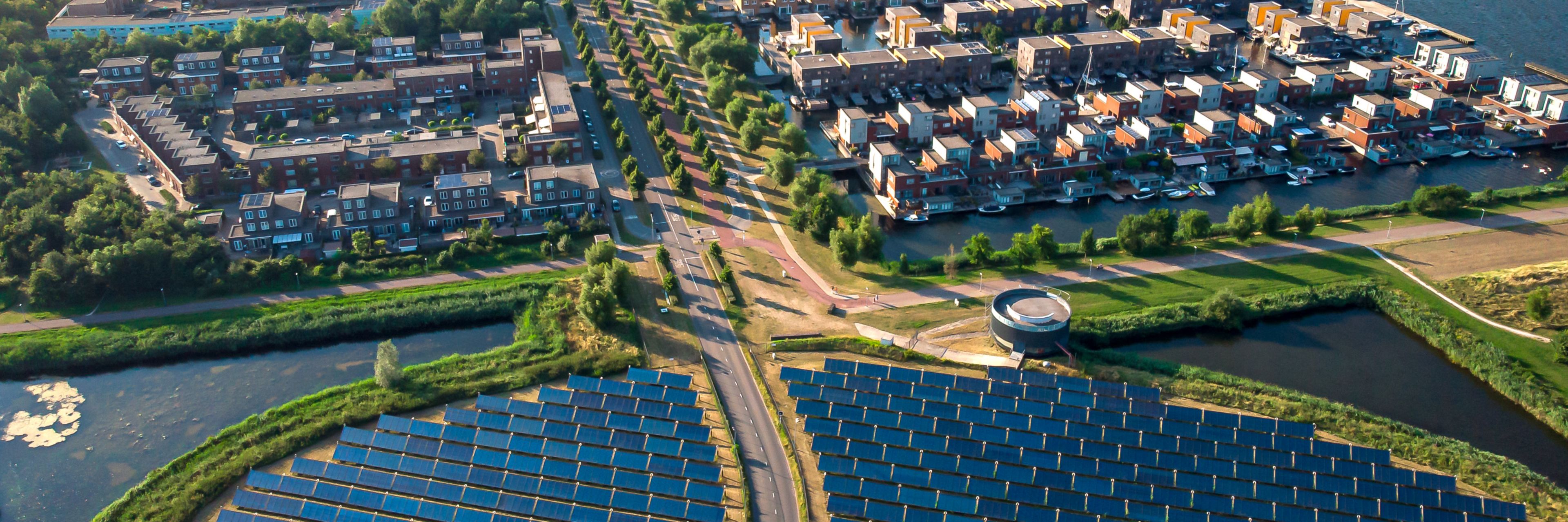 Modern sustainable neighbourhood in Almere, The Netherlands. The city heating (stadswarmte) in the district is partially powered by a solar panel island (Zoneiland). Aerial view.; Shutterstock ID 1522386716; purchase_order: -; job: -; client: -; other: -